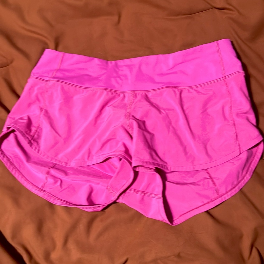 Like NEW Lululemon size 6 sonic pink speed up shorts